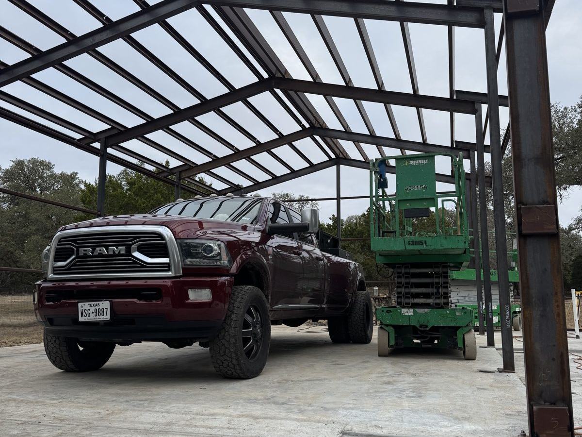 Steel building columns and roof framing